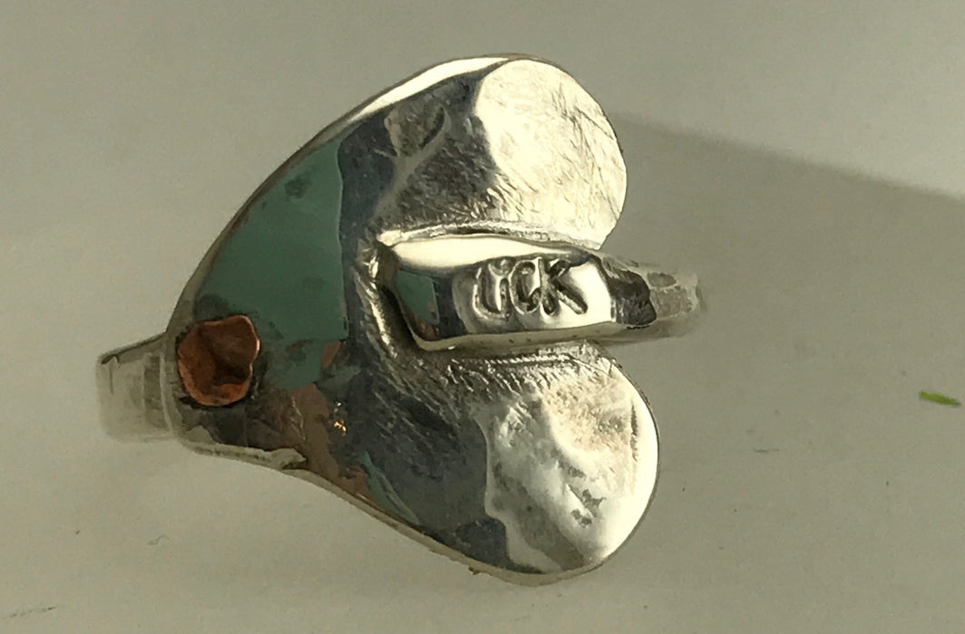 Saddle ring ( silver and copper rivet ring)