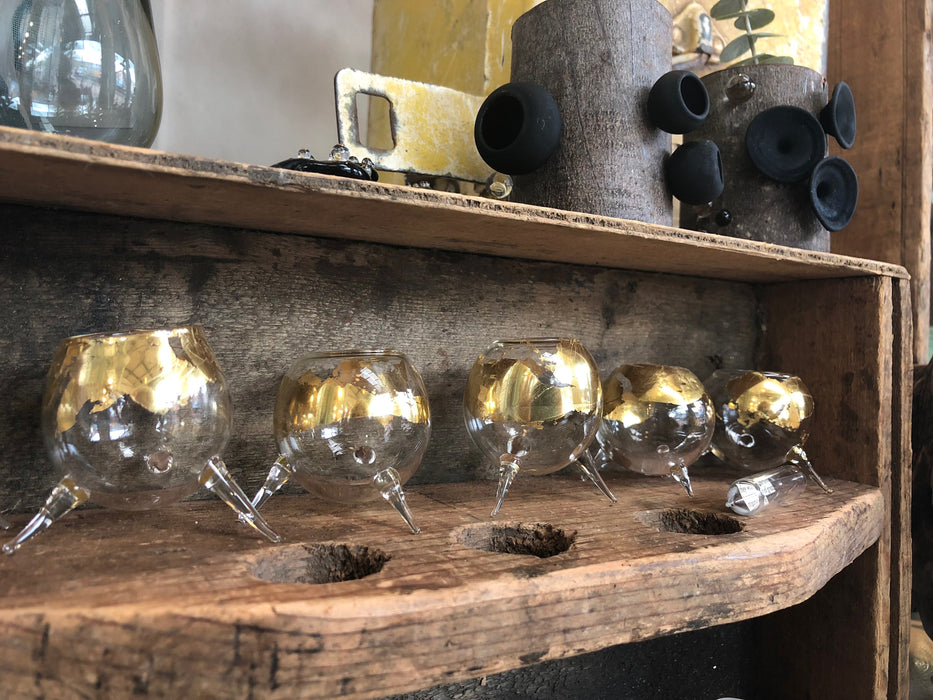 Tiny gold leaf glass vessels