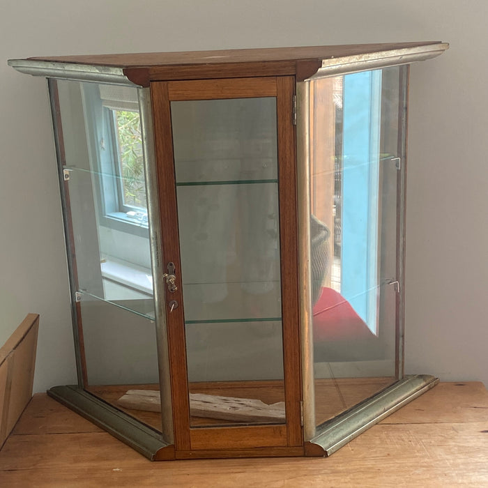 Triangular zinc edged display cabinet