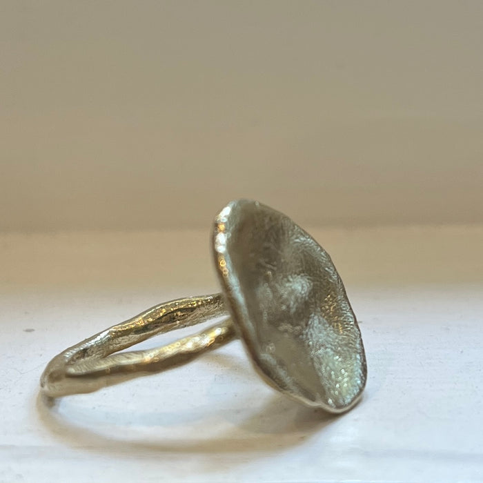 Gold pebble disc ring