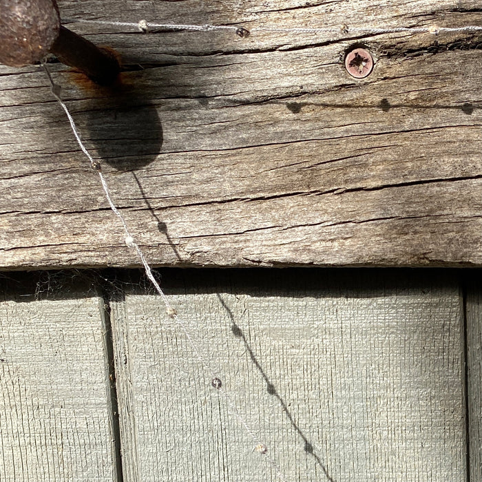 Grey tiny wool bobbles necklace