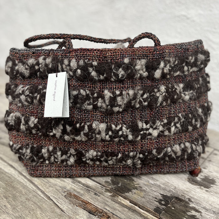 Raffia tote basket with carded wool