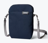 Bellroy City Pouch crossbody bag in navy with grey strap, front view