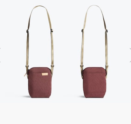 Bellroy City Pouch crossbody bag in plum with olive strap, front and back view