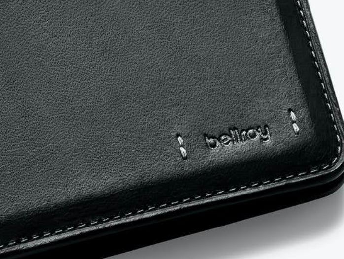 Bellroy Hide & Seek leather wallet in black, close-up of the embossed logo