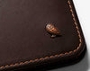 Bellroy Hide & Seek leather wallet in java/toffee, close-up of stitching and logo