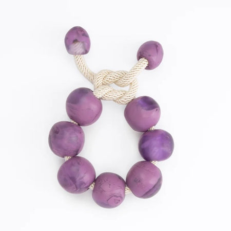 Dinosaur Designs Bold ball bracelet, grape purple resin beads on cream cord