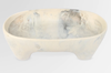Dinosaur Designs Long offering bowl in light horn, cream marbled resin on short feet