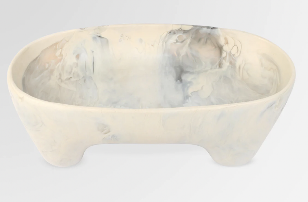 Dinosaur Designs Long offering bowl in light horn, cream marbled resin on short feet