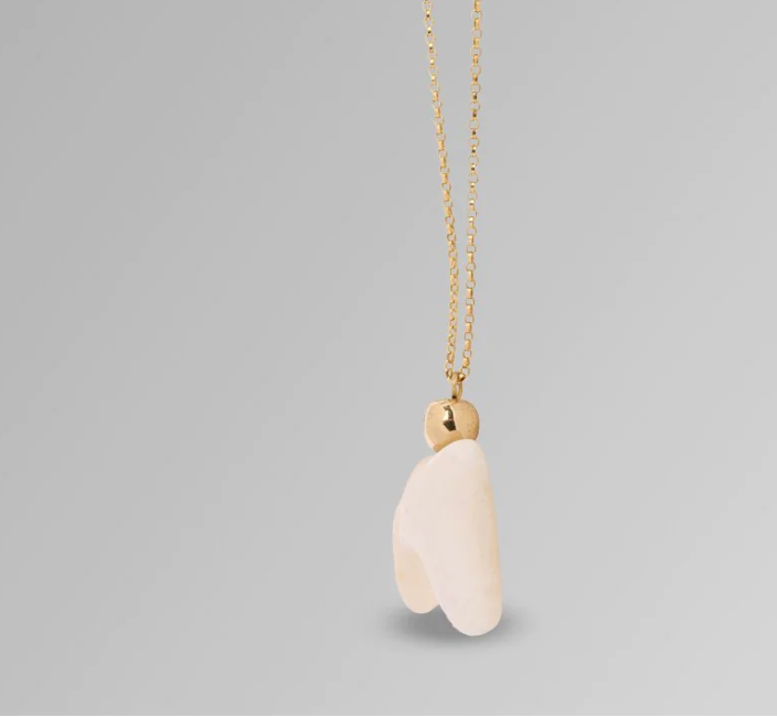 Dinosaur Designs Organic coral pendant in pale pink resin with gold cap on gold chain