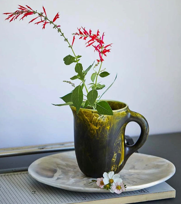 Dinosaur Designs large Rock jug in olive and yellow resin, styled with red flowers