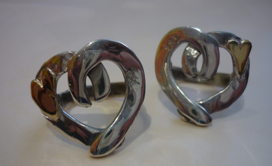 Two Flick Pope Cross Your Heart rings in oxidised silver