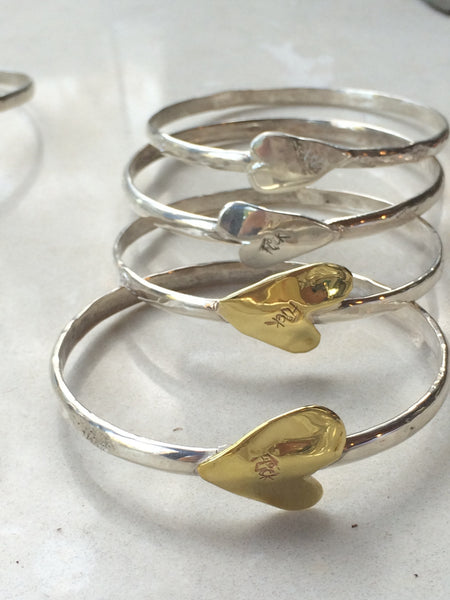 Flick Pope Love on the Side silver bangle with a brass heart