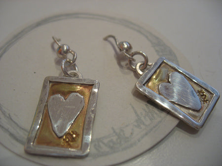 Flick Pope Postcard from the Heart silver drop earrings, laid flat