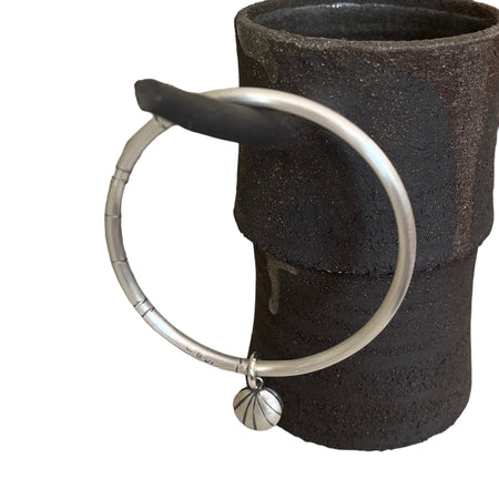 Katheryn Leopoldseder clam shell charm bangle