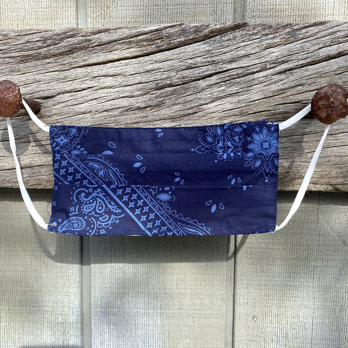 Pomme cotton face mask in navy diamond or paisley pattern