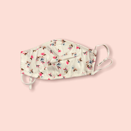 Pomme face mask with adjustable ear straps in white and fluoro pink