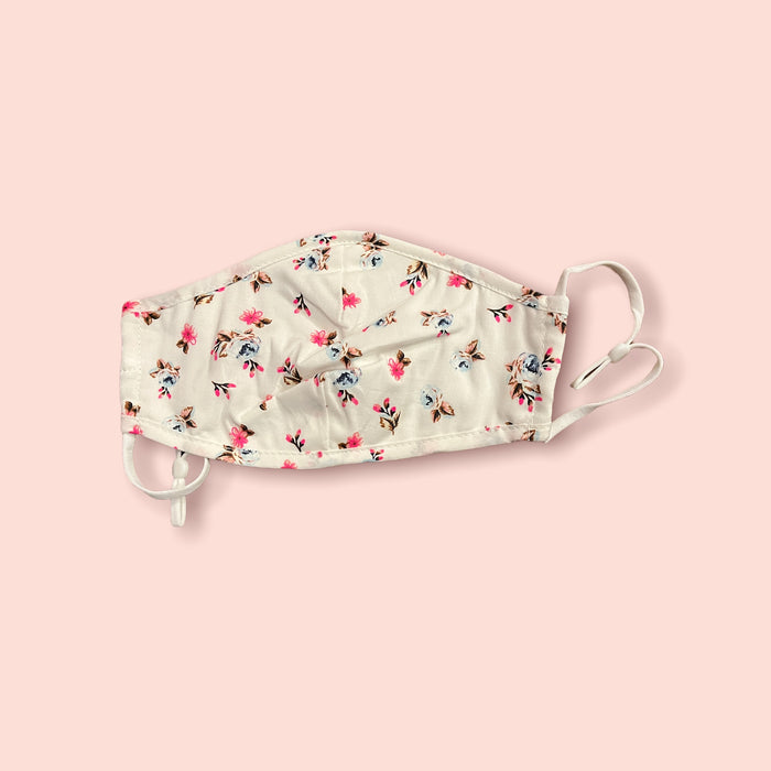 Pomme face mask with adjustable ear straps in white and fluoro pink