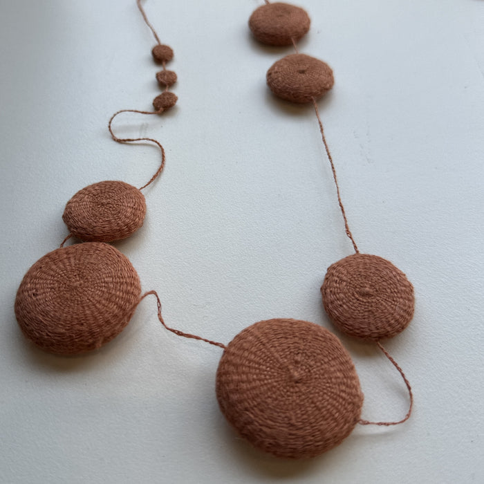 Sophie Digard hand crocheted necklace with large apricot flat discs