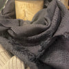 Sophie Digard fine wool embroidered stole in charcoal grey, draped with frayed edges